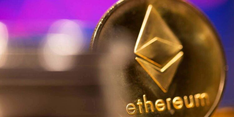 FILE PHOTO: A representation of virtual currency Ethereum is seen in front of a stock graph in this illustration taken February 19, 2021. REUTERS/Dado Ruvic/Illustration