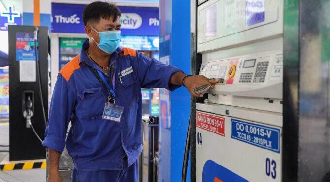 Gasoline prices slip from 3-month high