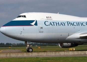 Cathay Pacific to halve profit payout to employees