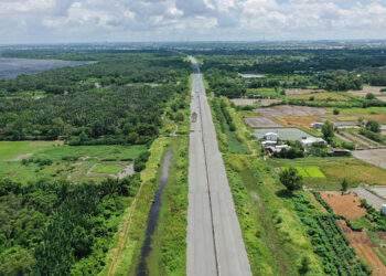 Wife pressures me to sell $83,000 land plot to build house, pay debt
