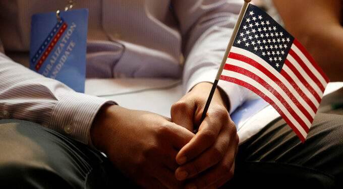 Which country has the highest number of workers with H-1B visas in the US?