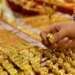Gold price plummets from peak