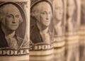 Dollar creeps up against dong