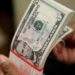 Dollar declines on black market