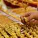 Gold bar prices dip while global rates rise