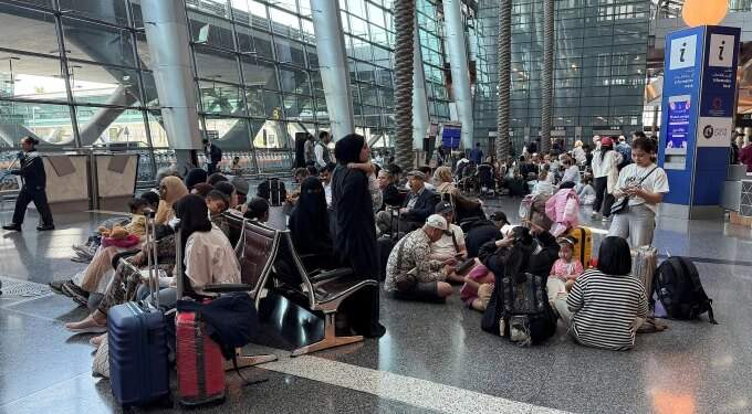 Singapore-bound travelers among thousands stranded at one of world’s busiest airports