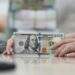 Suy yếu, tỷ giá chợ đen tăng 20 VND/USD
