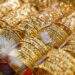 Gold prices gain as global rates climb