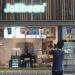 A person takes a picture of a Jollibean outlet in Singapore. Photo from Facebook/JollibeanSingapore