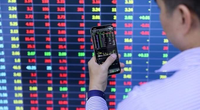 Stocks tumble sharply after reaching historic peak