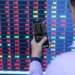 Stocks tumble sharply after reaching historic peak