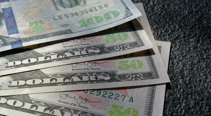 Dollar edges up against dong on black market