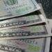 Dollar edges up against dong on black market