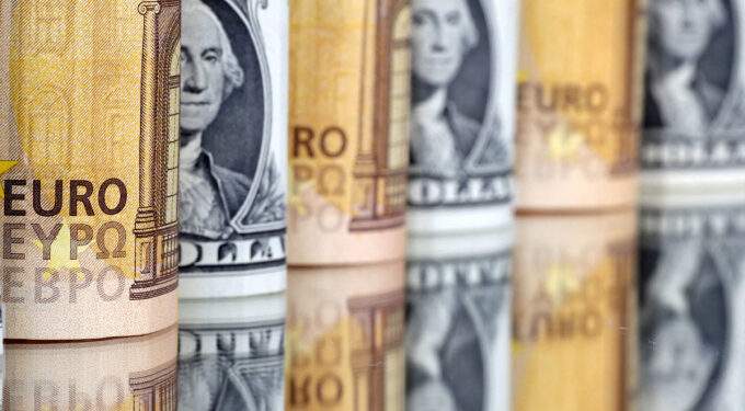 Dollar edges up against dong