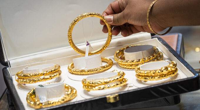 Gold slips as hawkish Fed comments spark market sell-off