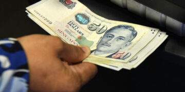 Who appears on all Singapore dollar banknotes?