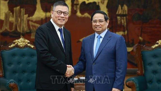 Thủ tướng Phạm Minh Chính tiếp ông Hồng Thiên Chúc, Chủ tịch Tập đoàn Texhong (Trung Quốc). Ảnh: TTXVN.