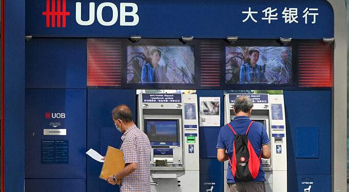 Singapore’s UOB to give 6,000 junior employees half-month salary payout