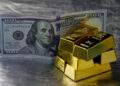 Gold prices stall as investors turn to dollar hedge amid Iran conflicts