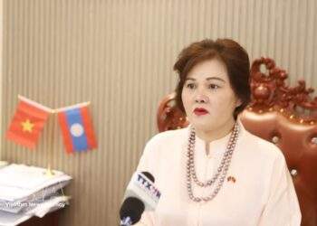 Vietnamese businesses in Laos express confidence in national political system ahead of general elections