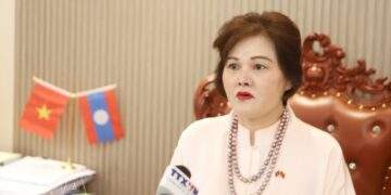 Vietnamese businesses in Laos express confidence in national political system ahead of general elections