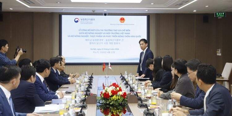 Lễ công bố mở cửa thị trường thịt gà chế biến giữa Việt Nam và Hàn Quốc ngày 22/4. Ảnh: Khương Trung.