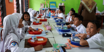 Indonesia cuts free meal budget as petrol prices soar