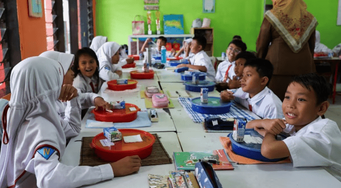 Indonesia cuts free meal budget as petrol prices soar